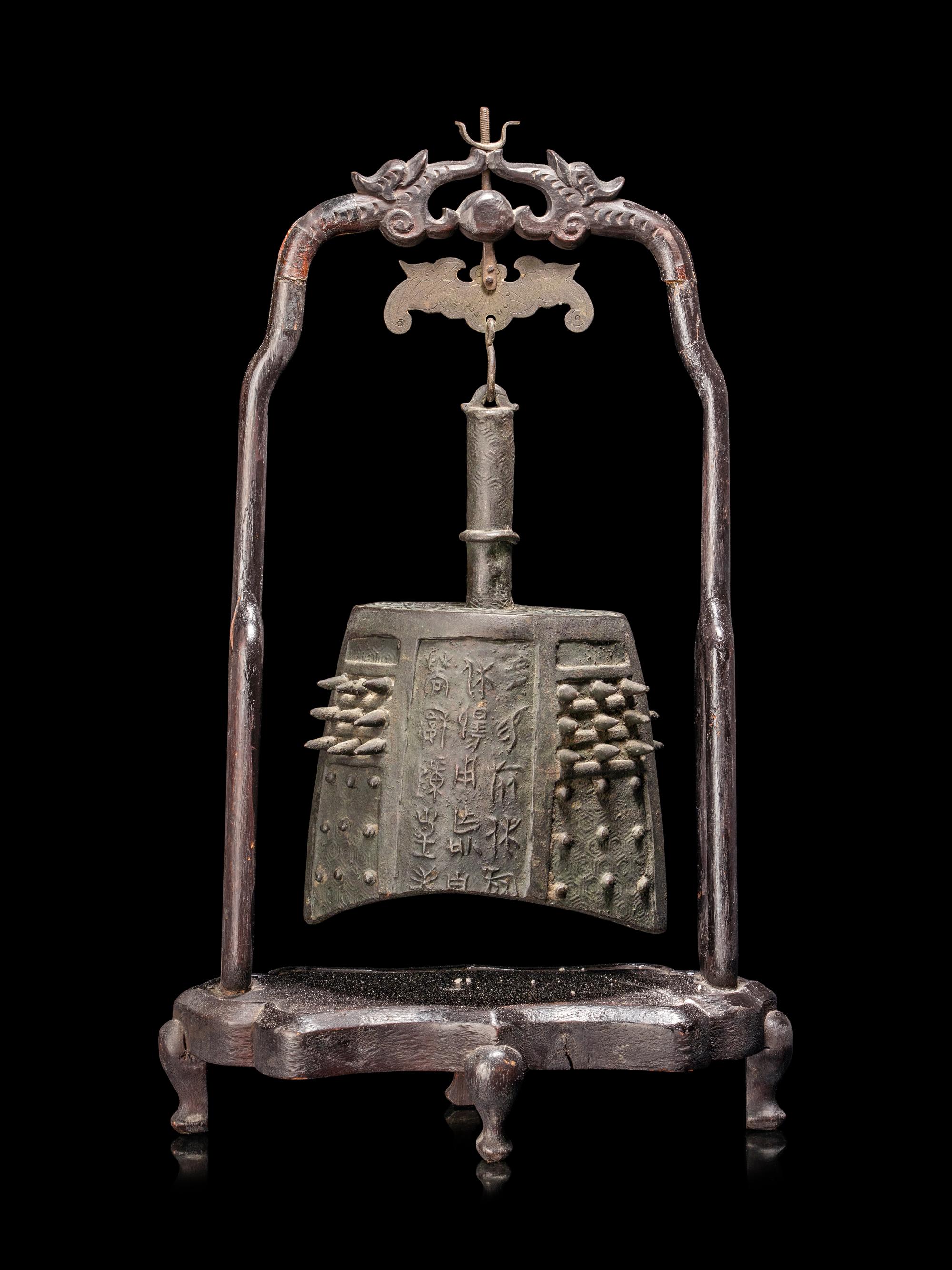 A Chinese Bronze Bell with Stand