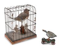 A Group of Tin and Composite Toys