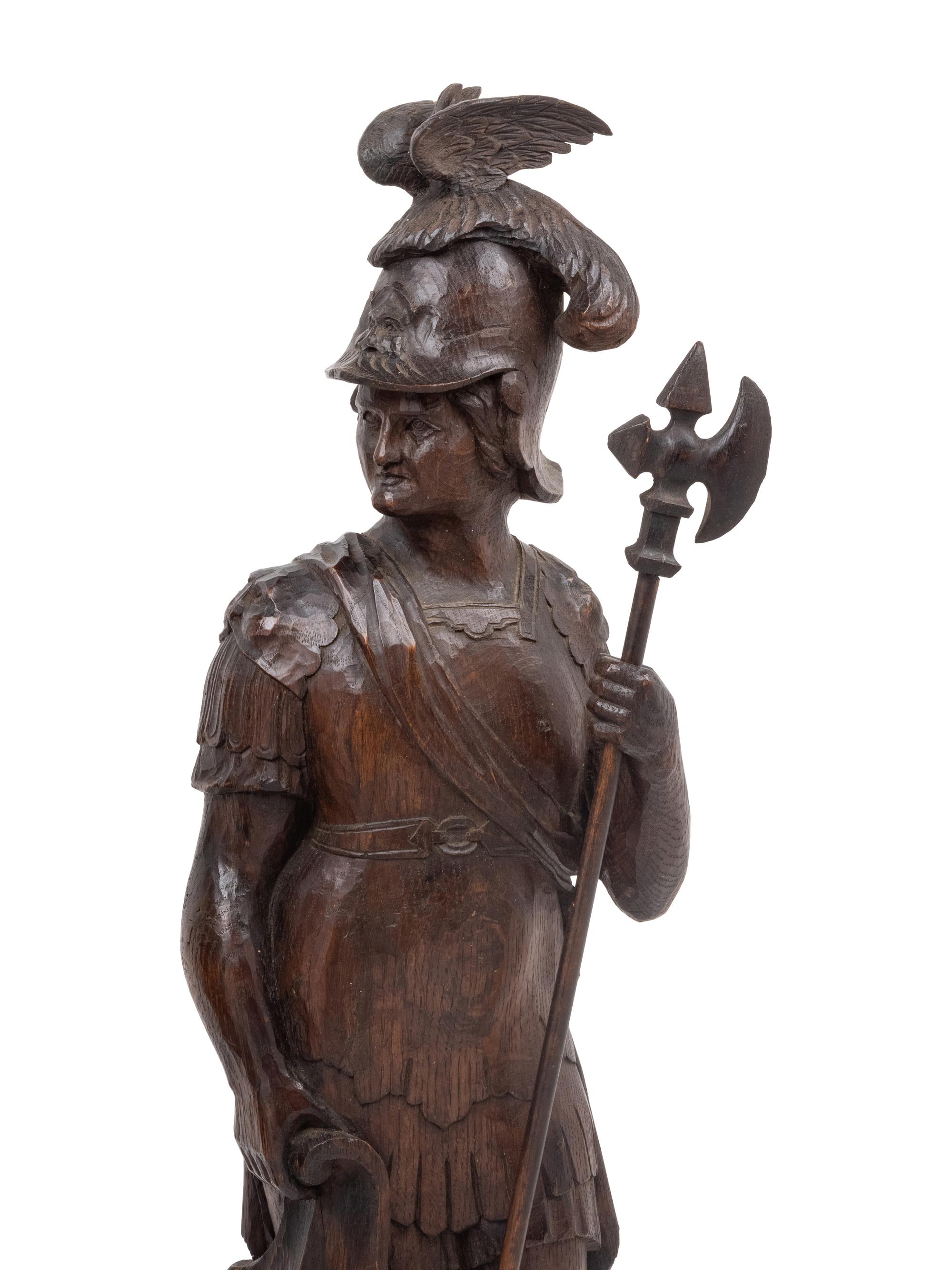 A Pair of Continental Carved Oak Figures of Knights