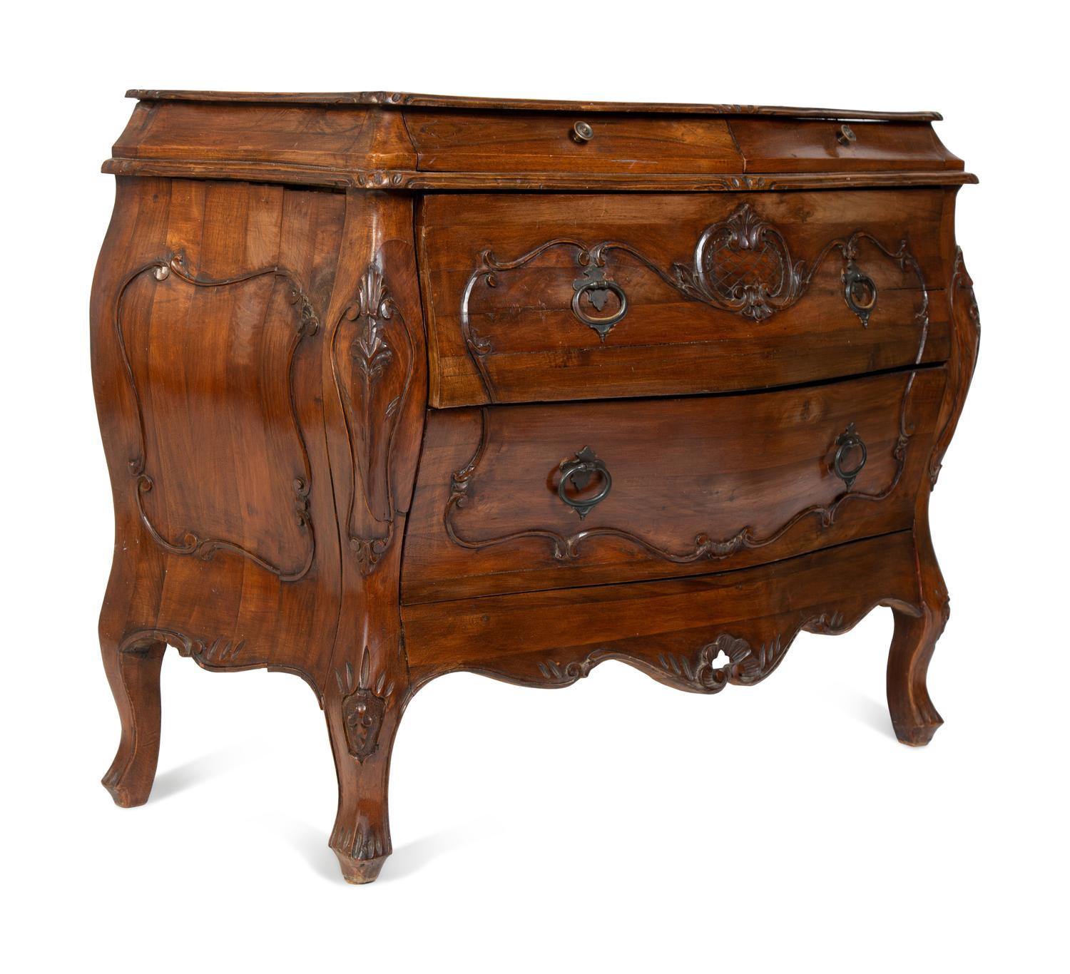 A French Provincial Style Carved Walnut Bombe Commode — 20TH CENTURY