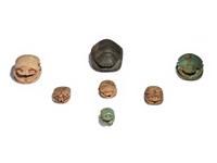 Seven Egyptian Faience and Stone Scarabs