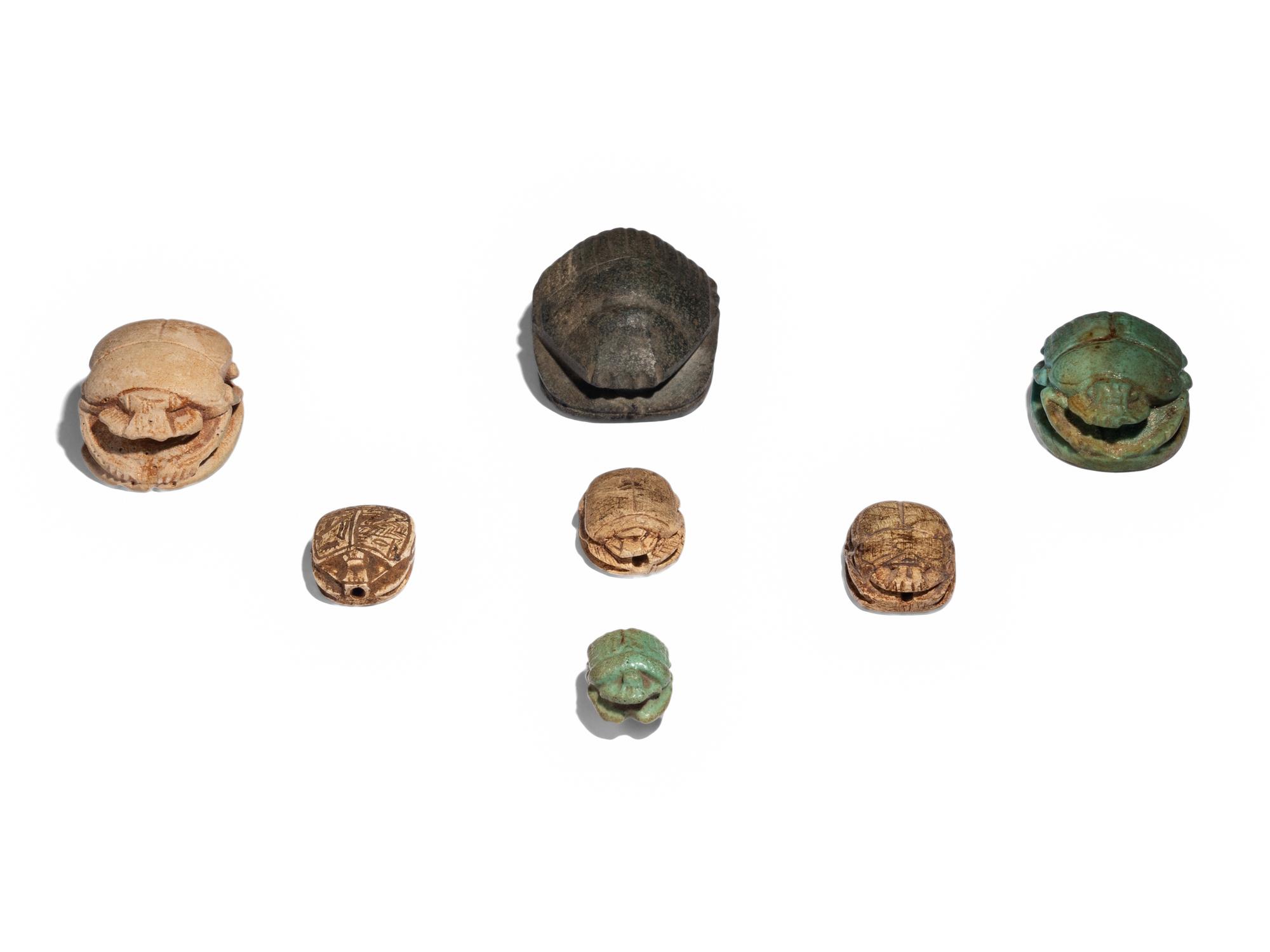 Seven Egyptian Faience and Stone Scarabs