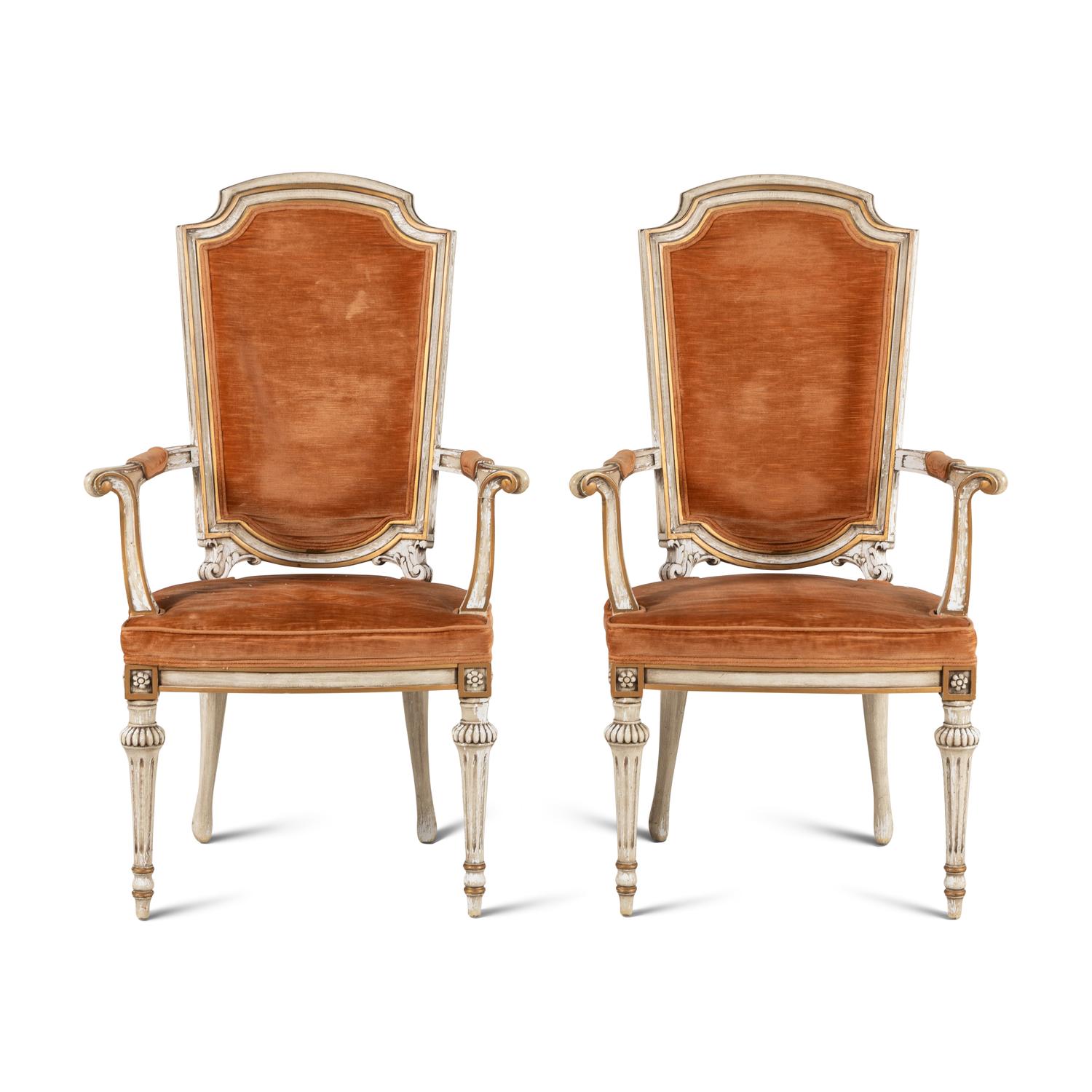 A Pair of Italian Crème-Painted and Parcel Gilt Armchairs