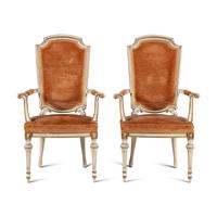 A Pair of Italian Crème-Painted and Parcel Gilt Armchairs