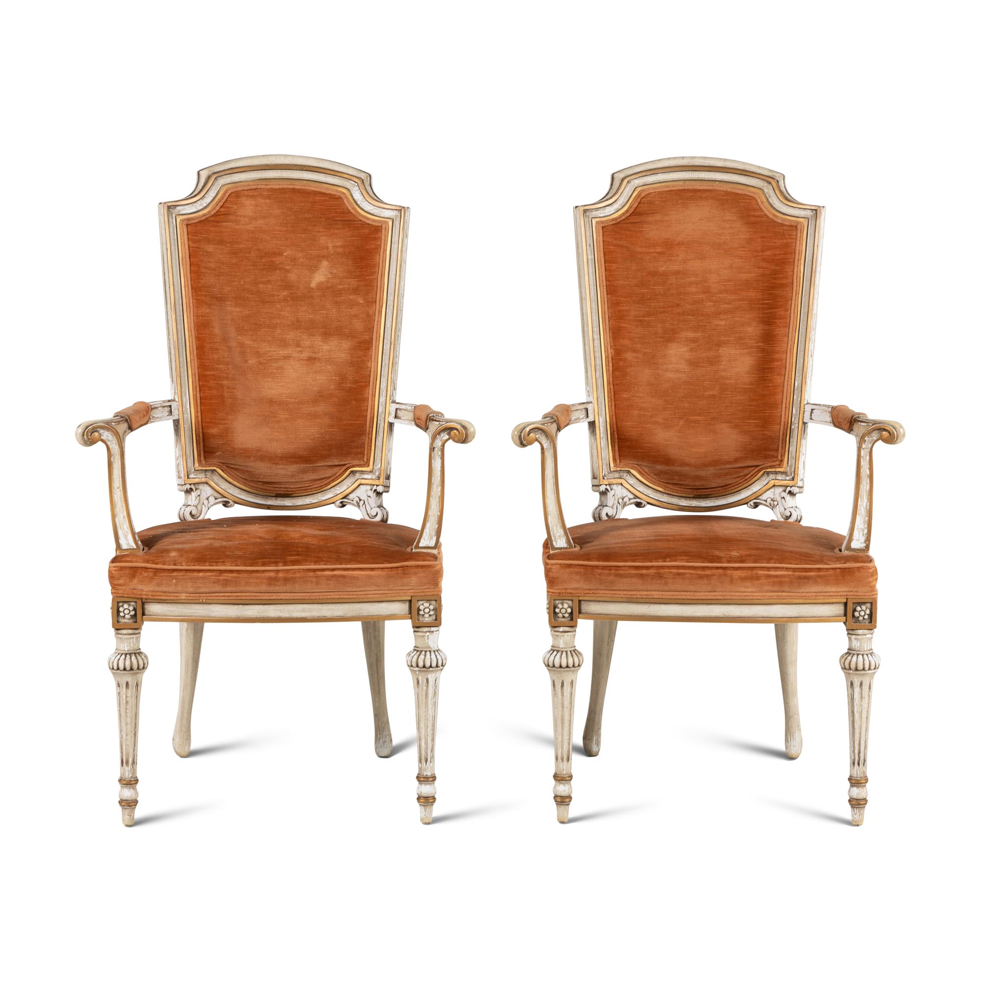 A Pair of Italian Crème-Painted and Parcel Gilt Armchairs