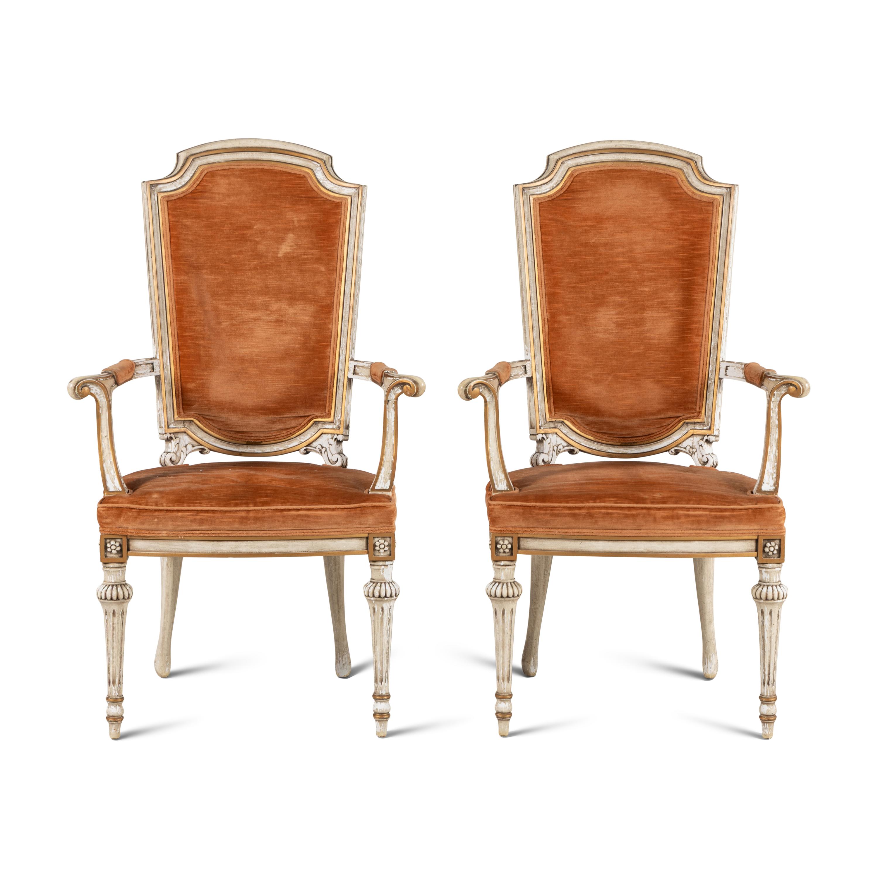 A Pair of Italian Crème-Painted and Parcel Gilt Armchairs