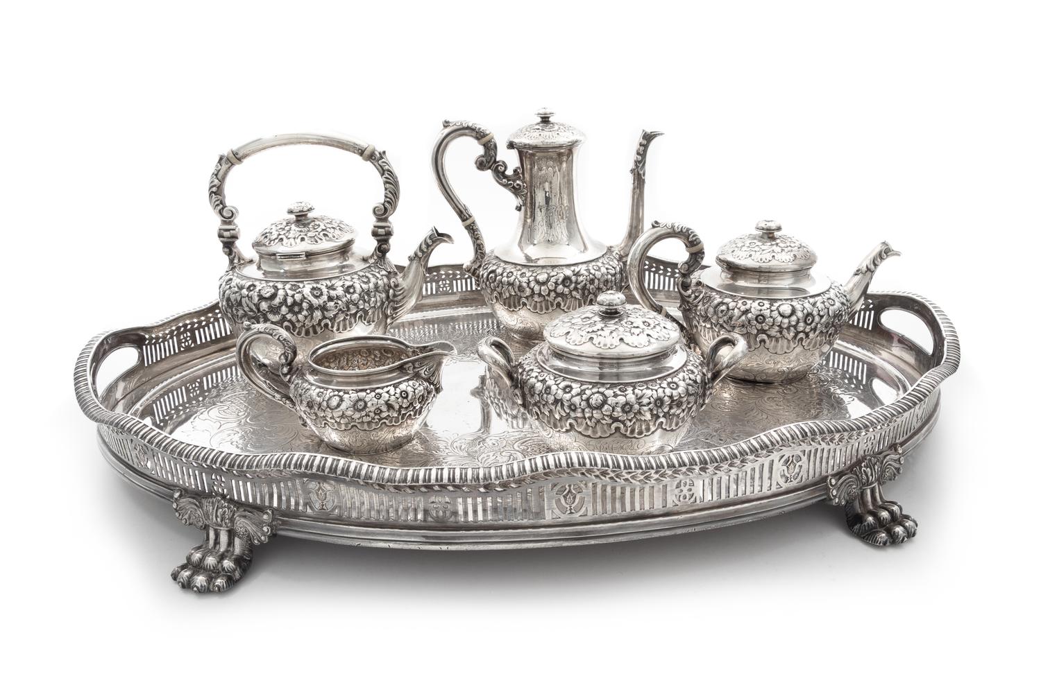 An American Silver Tea And Coffee Service, Theodore B. Starr, New York, NY, comprising a water kettle, a teapot, a coffee pot, a covere