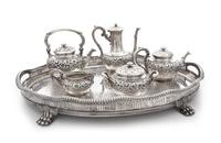 An American Silver Tea And Coffee Service, Theodore B. Starr, New York, NY, comprising a water kettle, a teapot, a coffee pot, a covere
