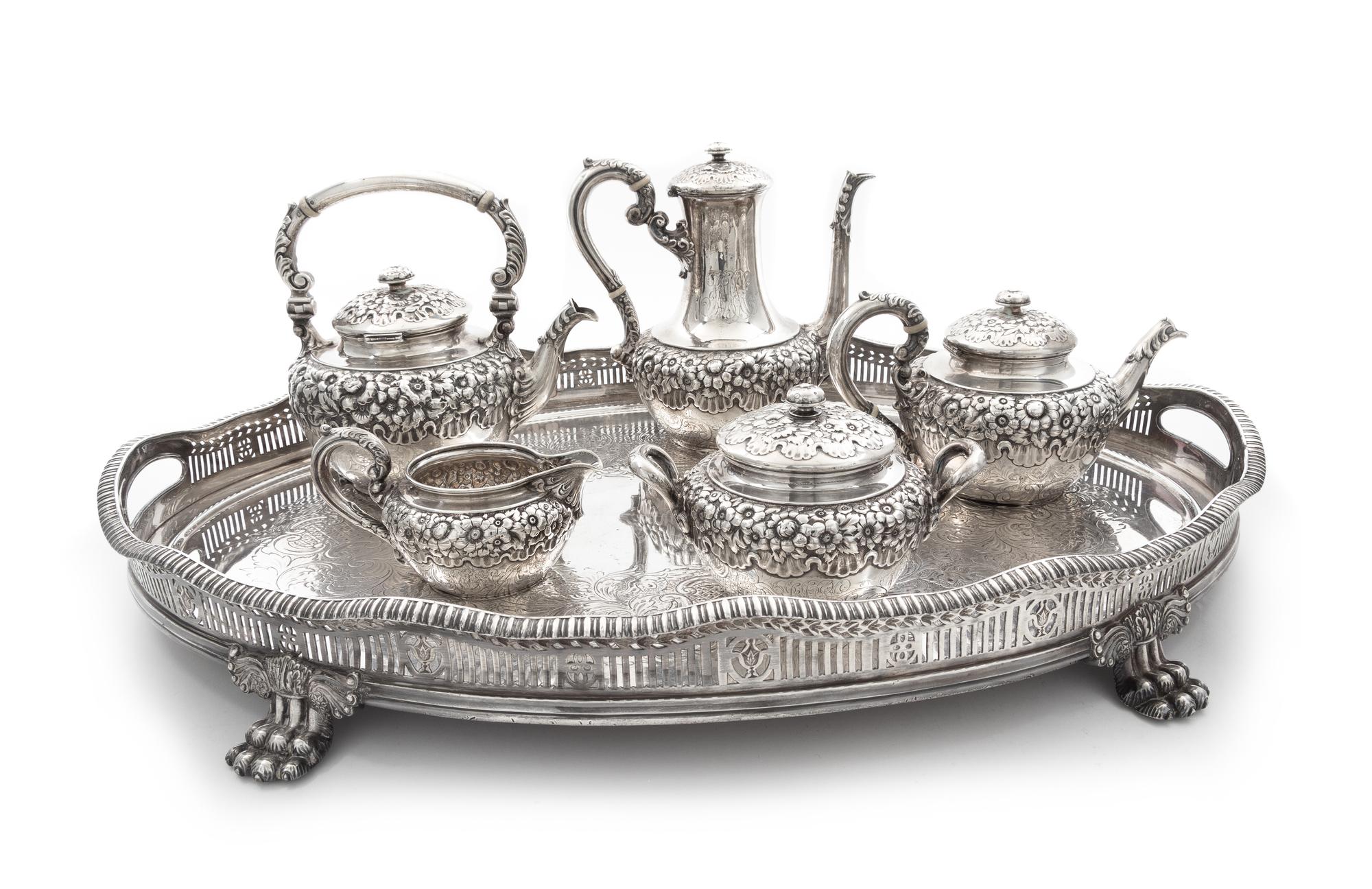 An American Silver Tea And Coffee Service, Theodore B. Starr, New York, NY, comprising a water kettle, a teapot, a coffee pot, a covere