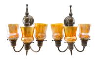 A Pair of Tiffany Studios Favrile Glass and Bronze Three-Light Sconces Height of shades 4 1/2 inches, height overall 16 inches.