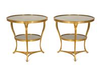 A Pair of French Empire Style Gilt Bronze and Black Marble Two Tier Gueridon Tables