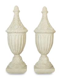 A Pair of Painted Composition Wall Appliqués