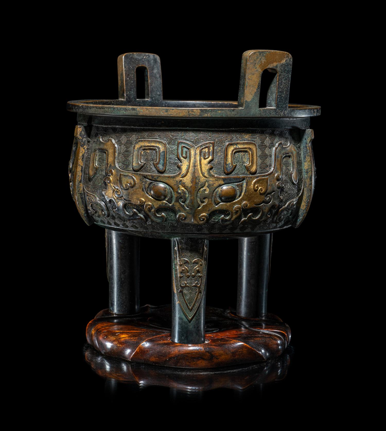 A Chinese Parcel Gilt Archaistic Bronze Bronze Ding Vessel
