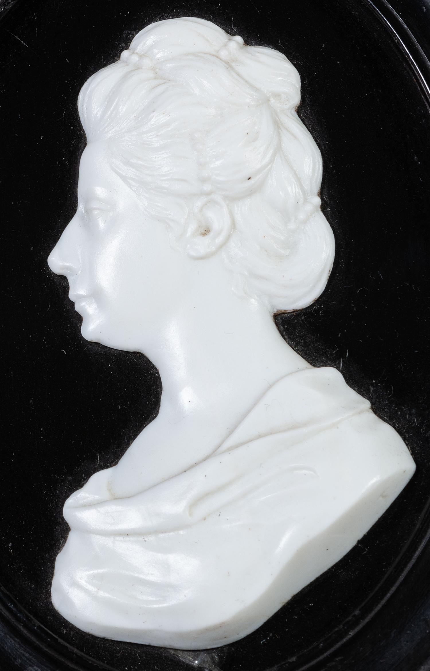 Two English White Paste Silhouette Bust Portraits of a Lady and a Gentleman