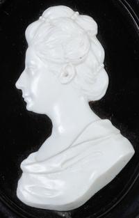 Two English White Paste Silhouette Bust Portraits of a Lady and a Gentleman