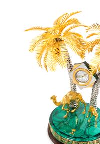 A Gilt Metal and Malachite Veneered Clock Height 18 1/2 inches. — MODERN