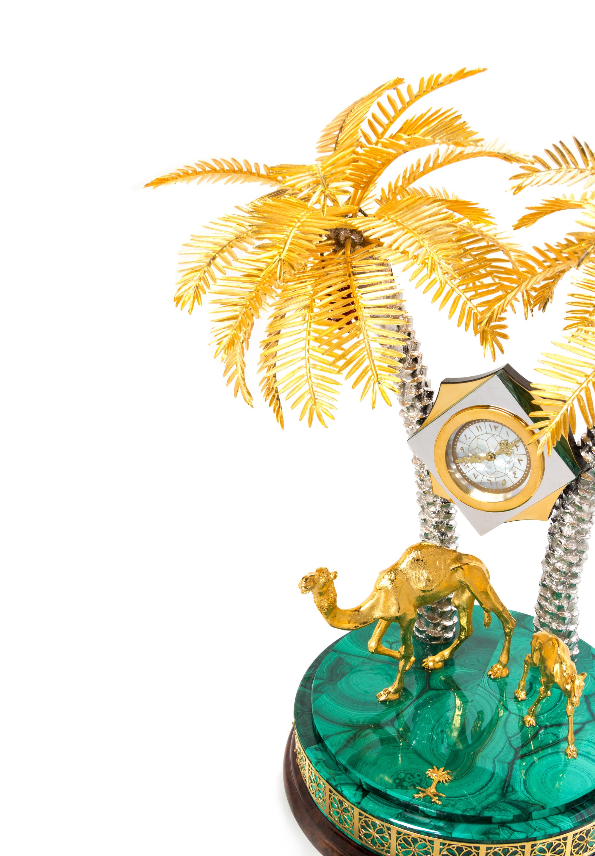 A Gilt Metal and Malachite Veneered Clock Height 18 1/2 inches. — MODERN