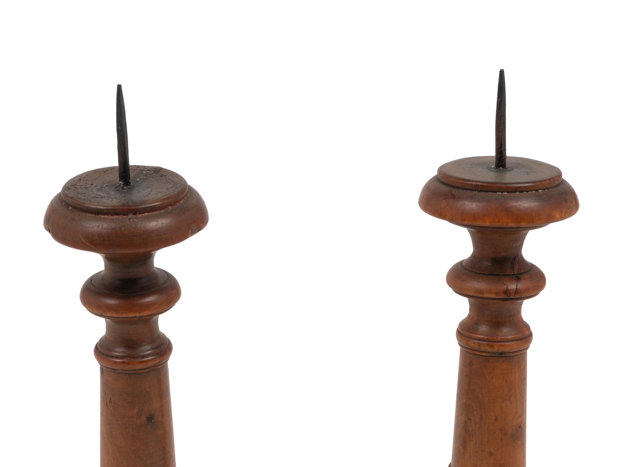 A Pair of French Olivewood "Pique Cierge" Candlesticks