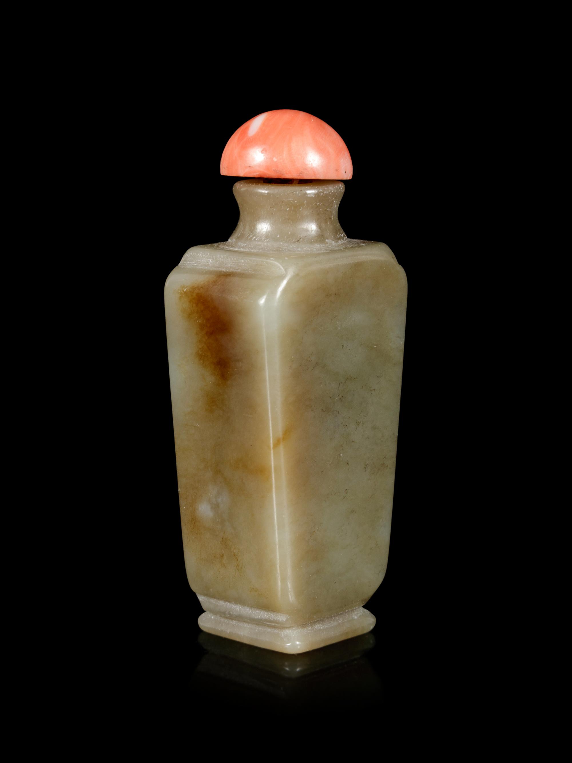 A Russet and Celadon Jade Snuff Bottle