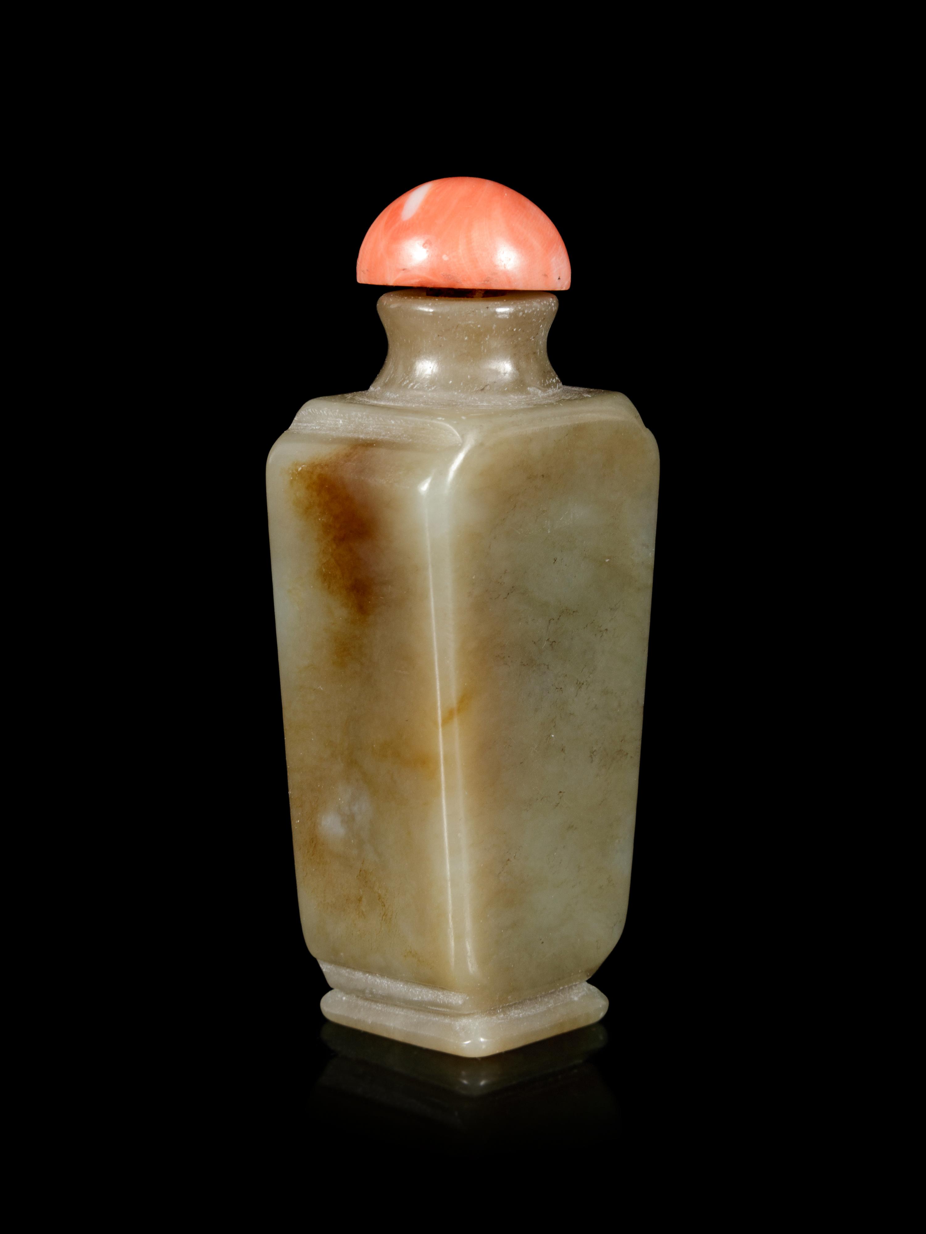 A Russet and Celadon Jade Snuff Bottle