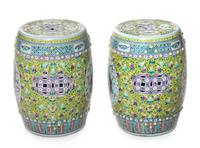 A Pair of Chinese Famille Rose Porcelain Garden Stools Height 19 1/4 inches. — 20TH CENTURY