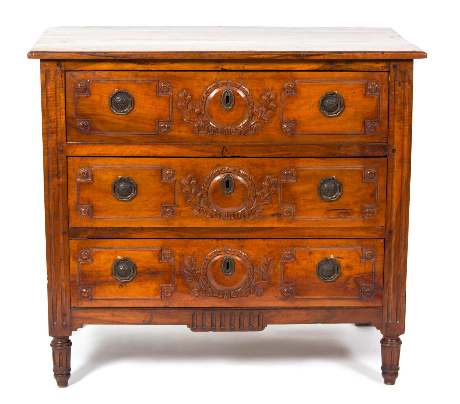 A French Provincial Carved Fruitwood Chest of Drawers Height 37 x width 41 x depth 23 inches. — 19TH CENTURY