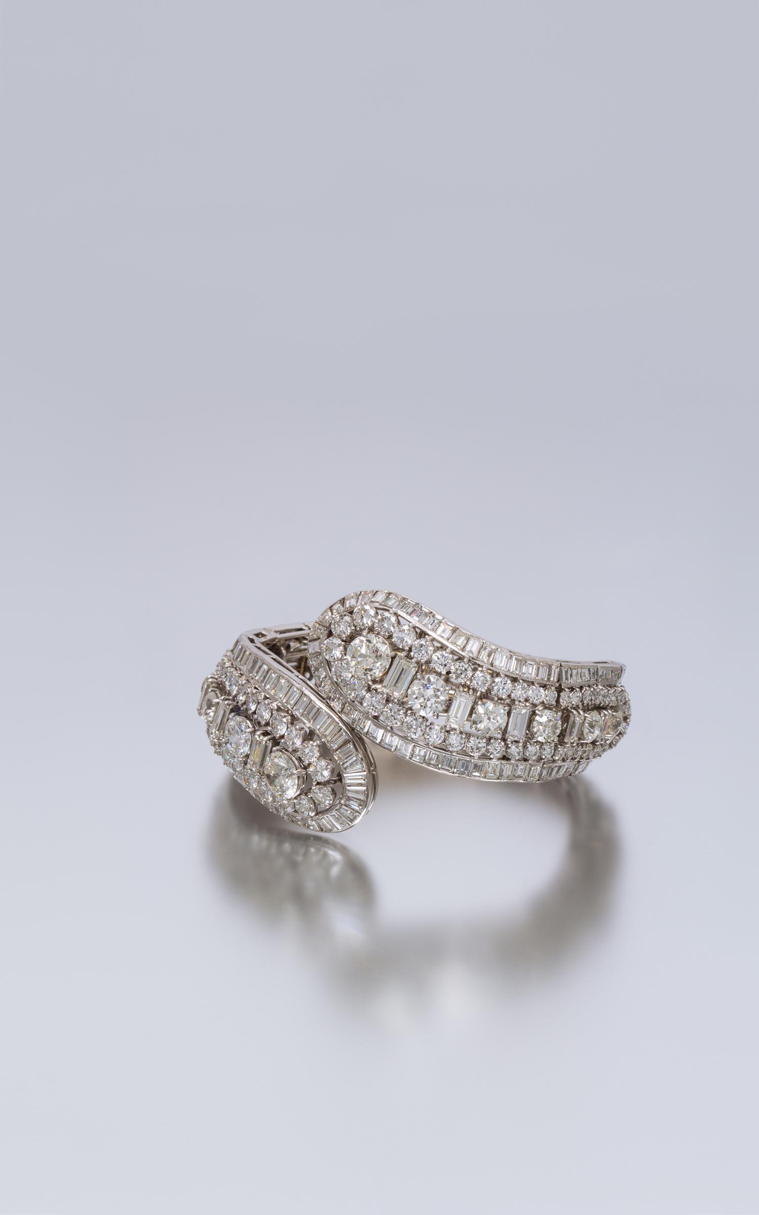 A Vintage Flexible Platinum and Diamond Bypass Bracelet, 51.60 dwts.