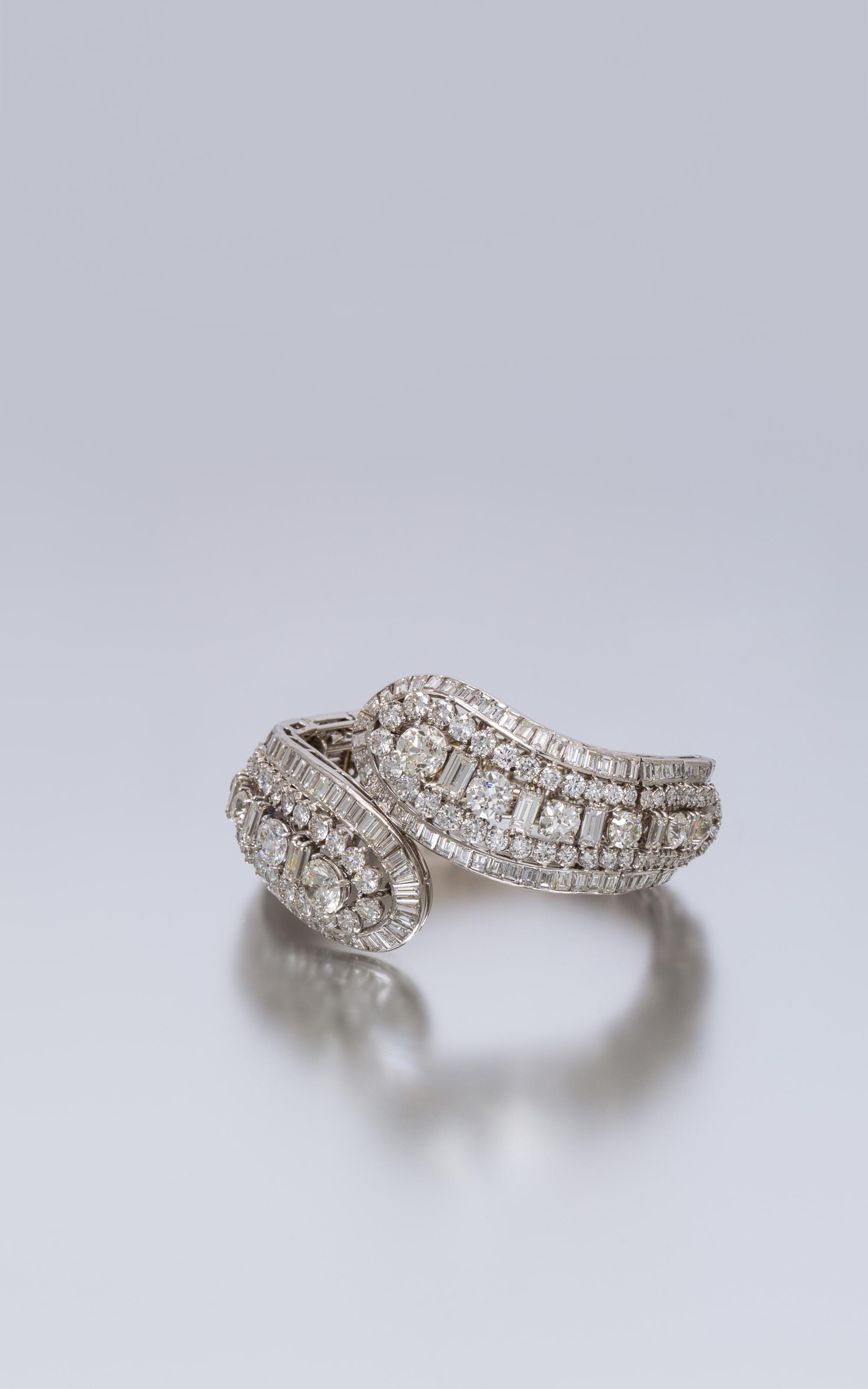 A Vintage Flexible Platinum and Diamond Bypass Bracelet, 51.60 dwts.