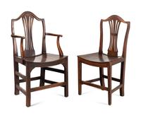 A Set of Six English Carved Oak Dining Chairs
