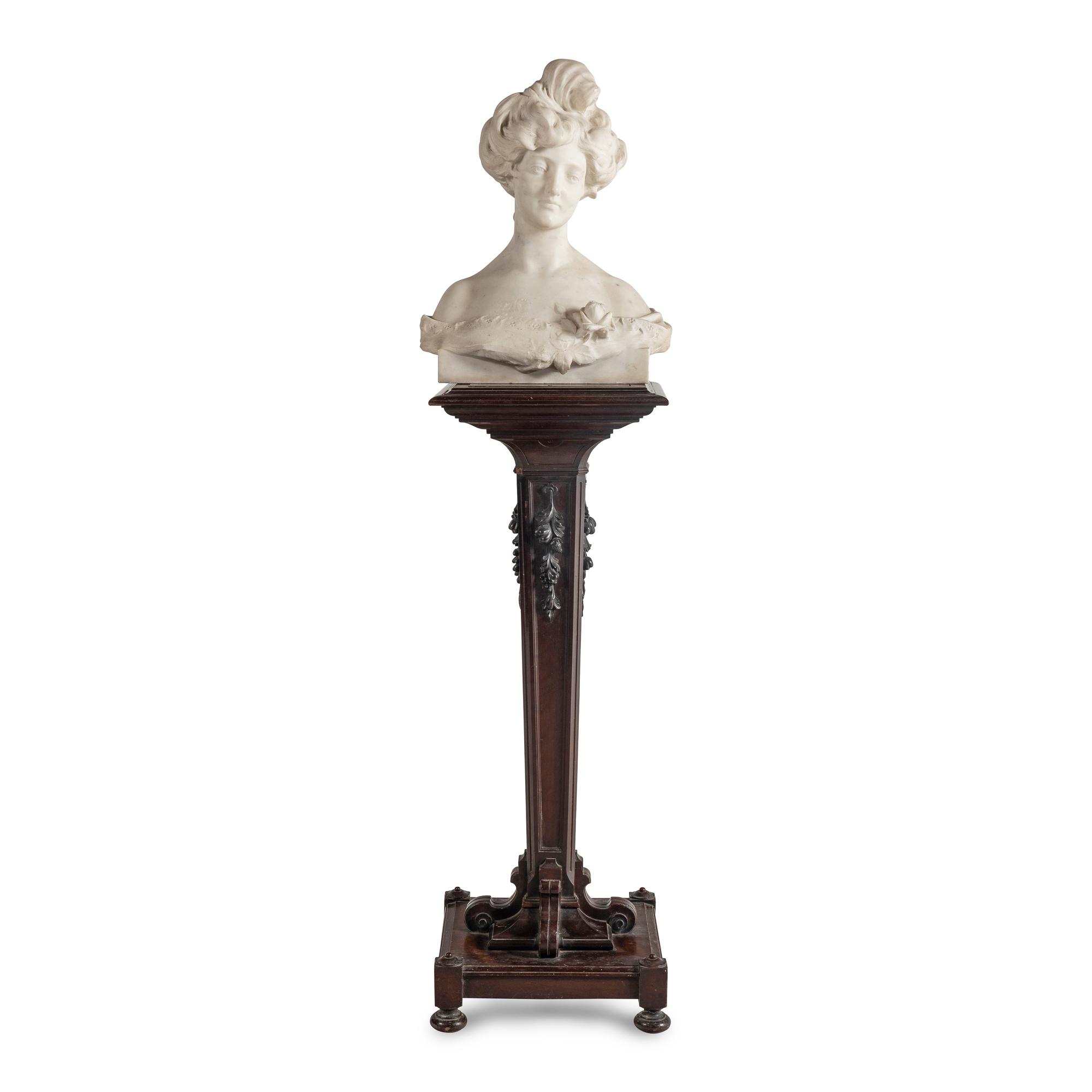 An Italian Carved Marble Bust of a Young Woman