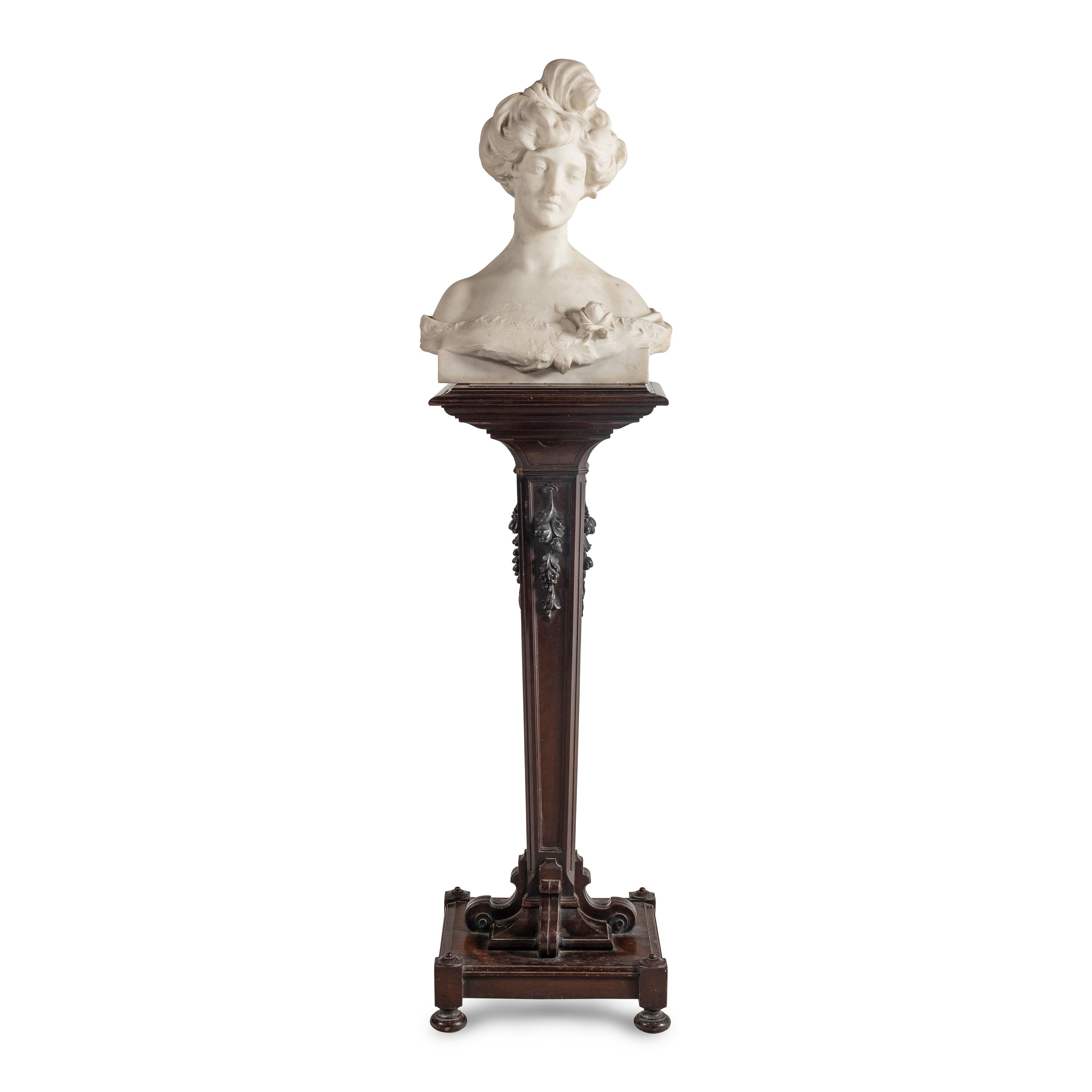 An Italian Carved Marble Bust of a Young Woman