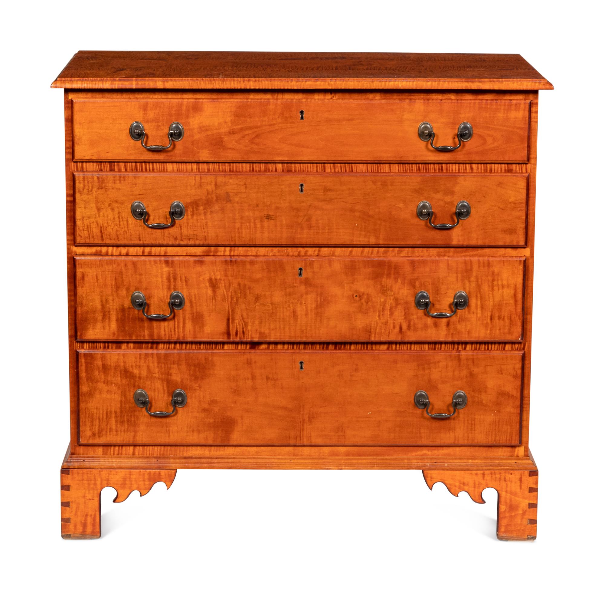 A Chippendale Style Tiger Maple Chest of Drawers