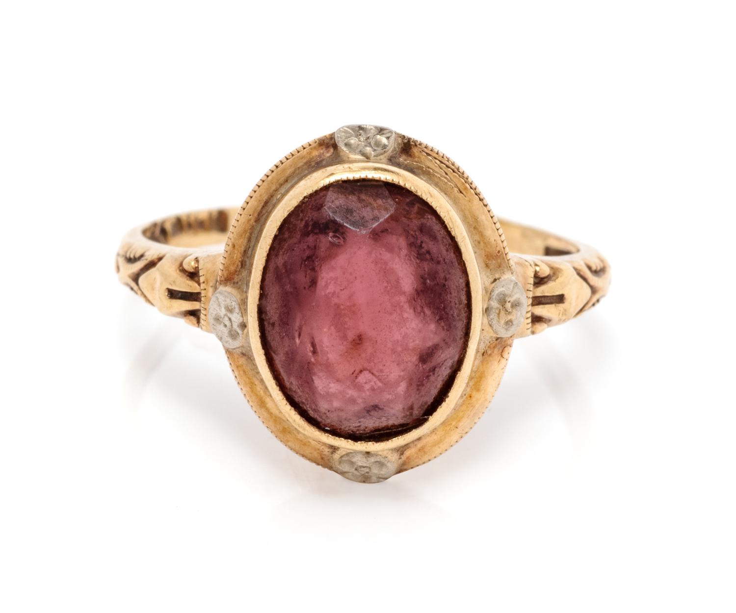 A Yellow Gold and Purple Simulant Ring,