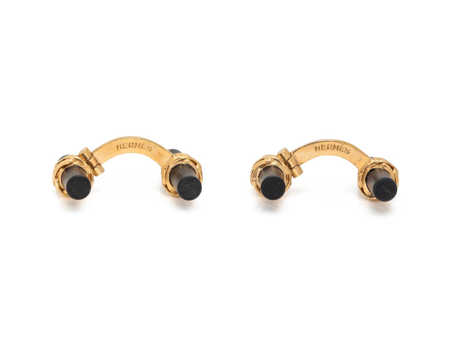 HERMÈS, YELLOW GOLD AND ONYX CUFFLINKS