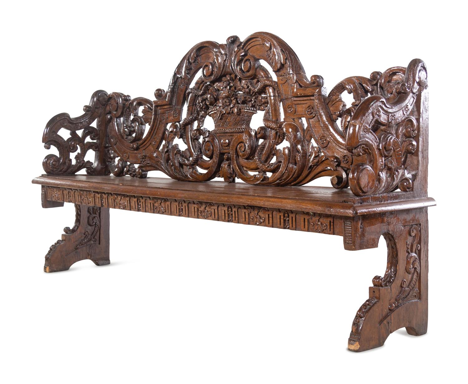 A Jacobean Style Carved Oak Hall Bench
