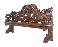 A Jacobean Style Carved Oak Hall Bench