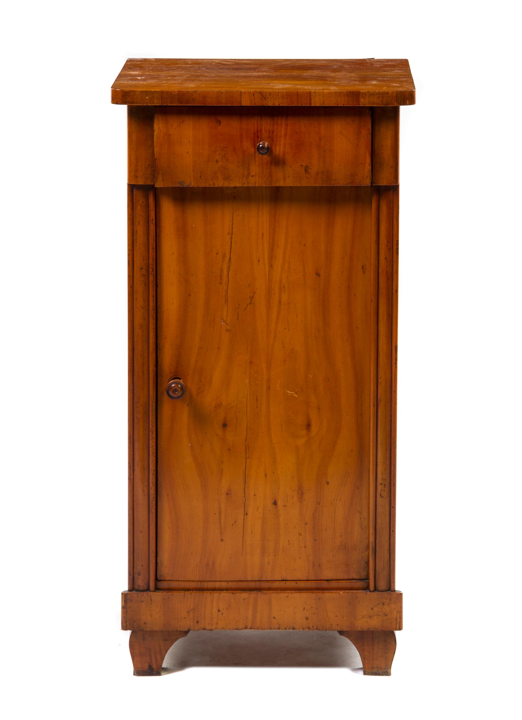 A Biedermeier Fruitwood Cupboard, Height 34 1/2 x width 17 x depth 14 1/4 inches.