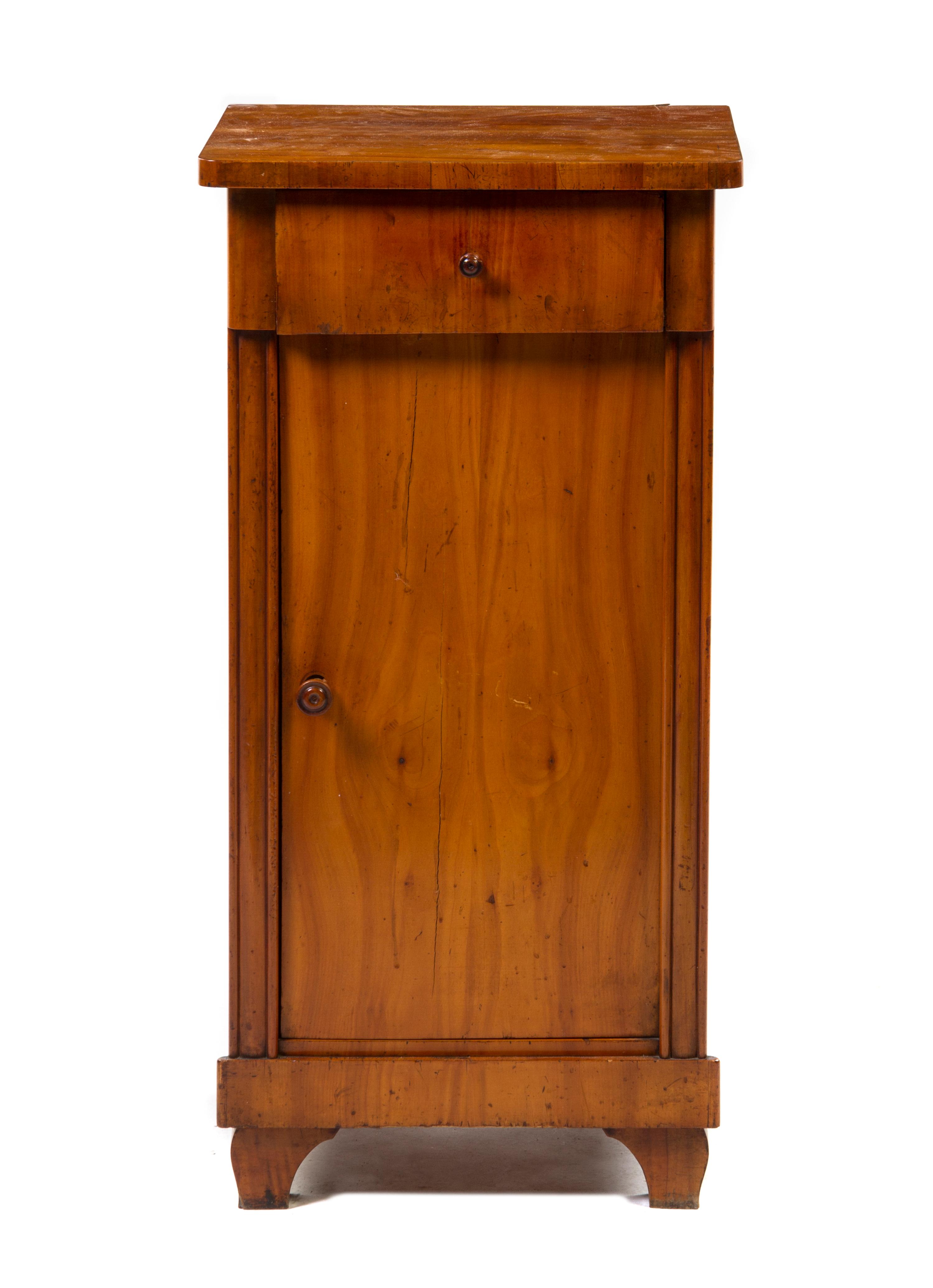 A Biedermeier Fruitwood Cupboard, Height 34 1/2 x width 17 x depth 14 1/4 inches.