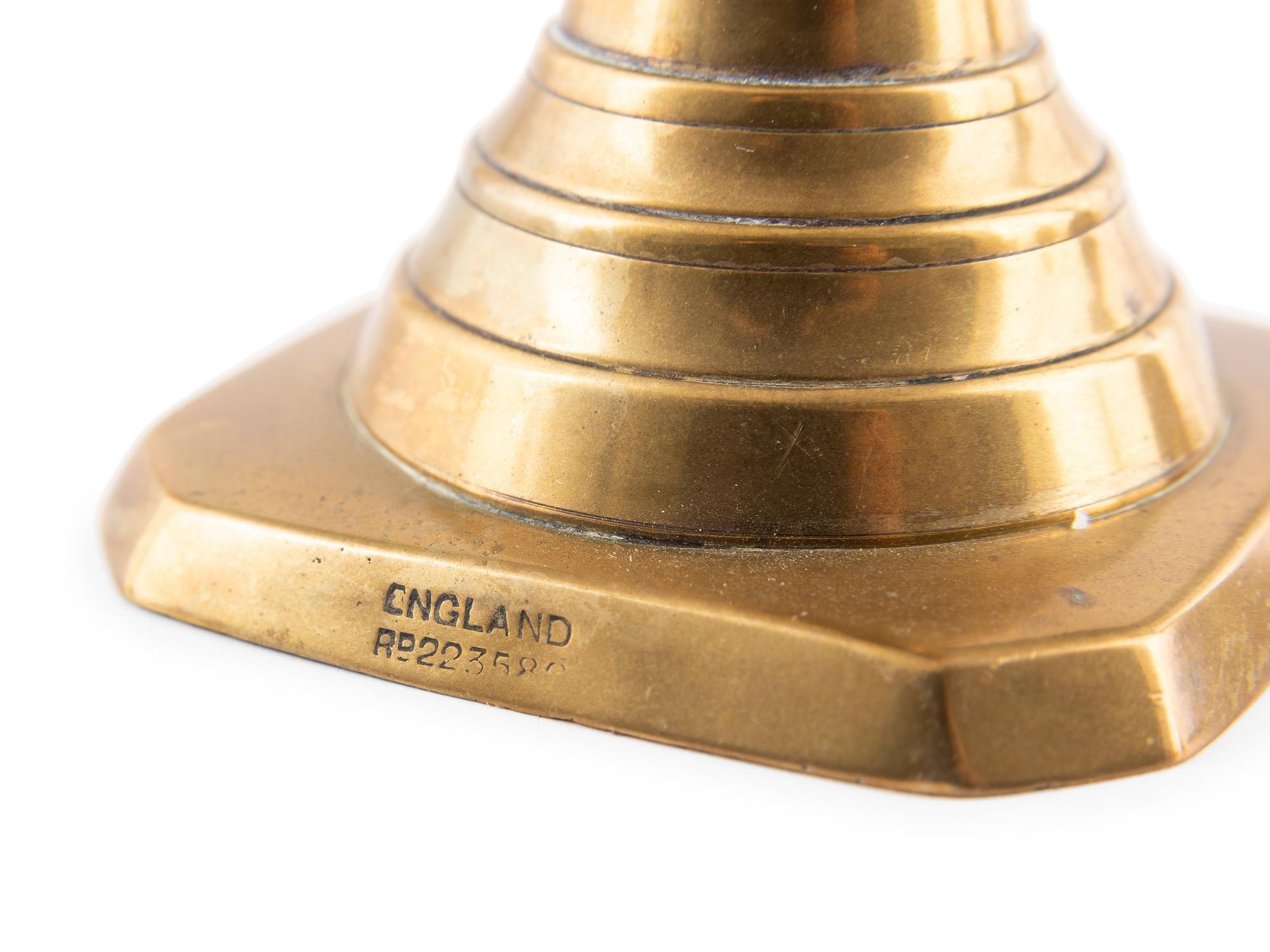 A Group of Brass Candlesticks