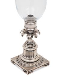 A Pair of Silvered-Metal and Glass Hurricane Candlesticks