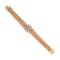 YELLOW GOLD, CULTURED PEARL, DIAMOND AND SYNTHETIC SAPPHIRE SURPRISE WRISTWATCH