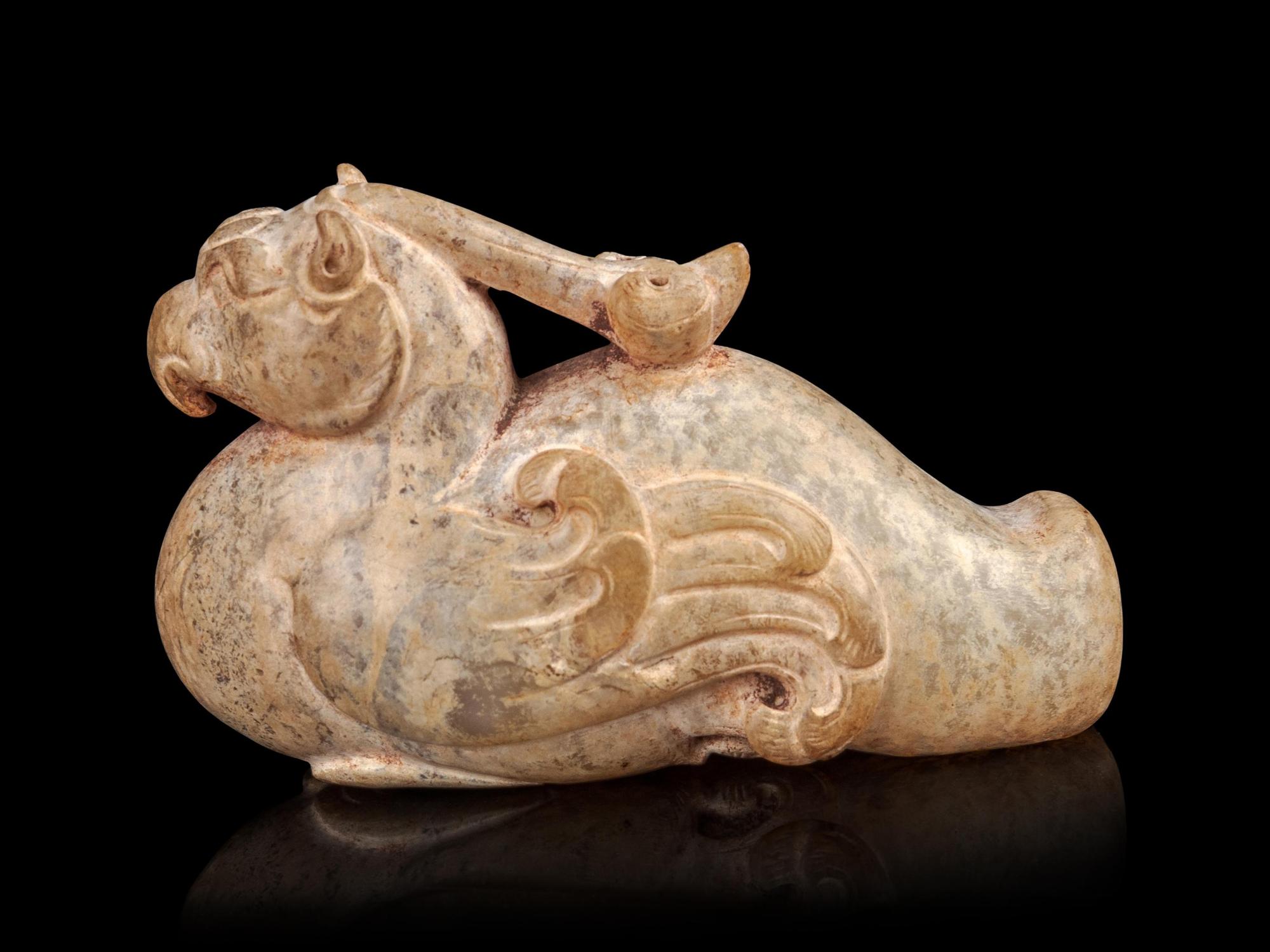 A Calcified Jade Figure of a Phoenix