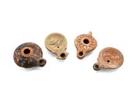 Four Ancient Terra Cotta Oil Lamps