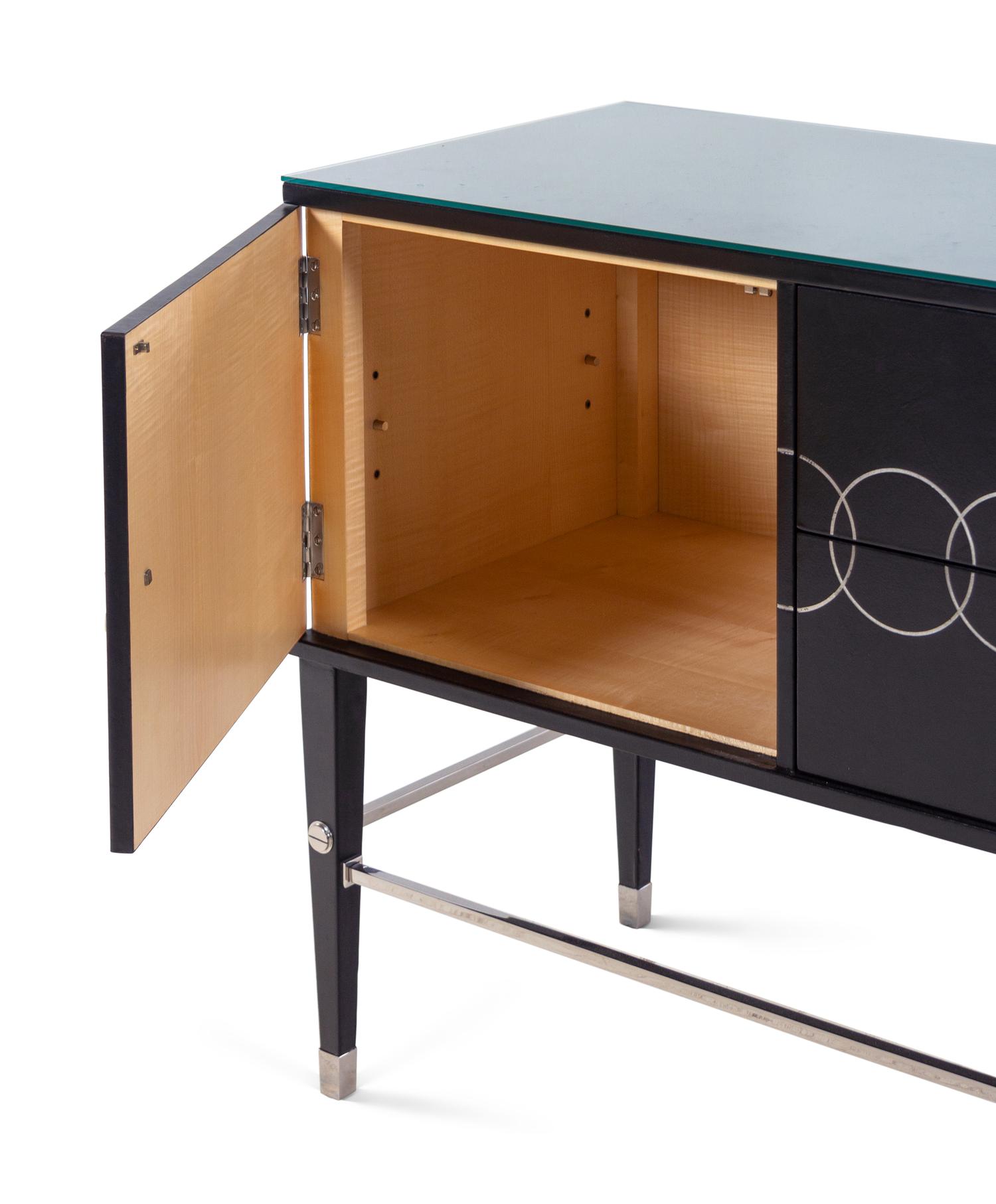 A Theodore Alexander Leather-Veneered Credenza