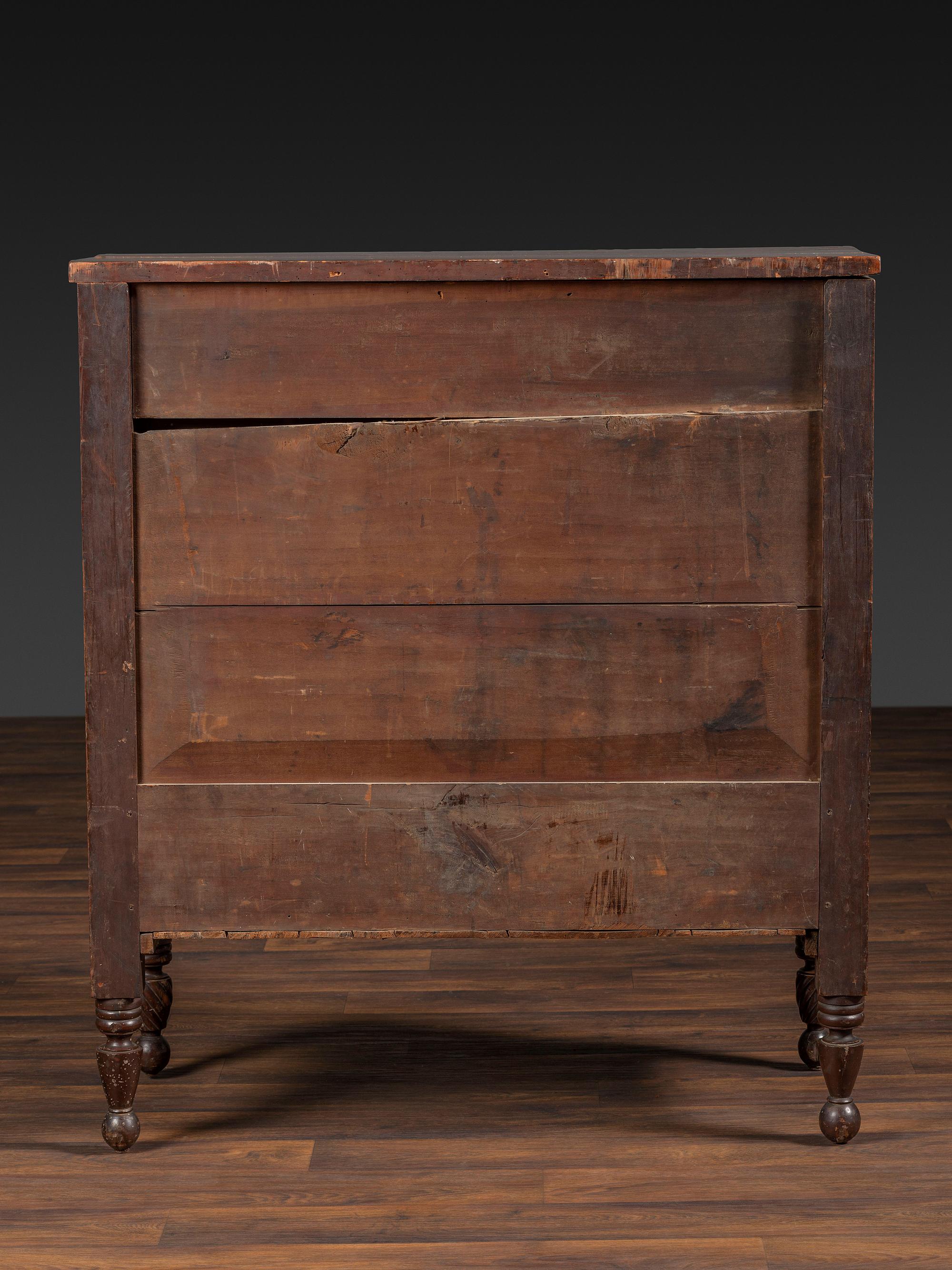 A Classical Tennessee Carved Cherrywood Chest of Drawers