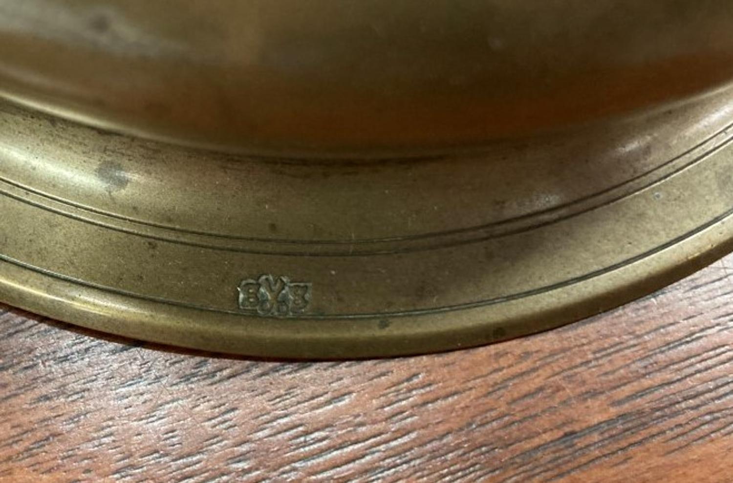 A Rare Continental Brass Bell-Bottom Candlestick