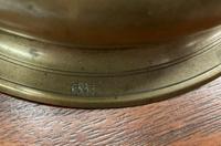 A Rare Continental Brass Bell-Bottom Candlestick