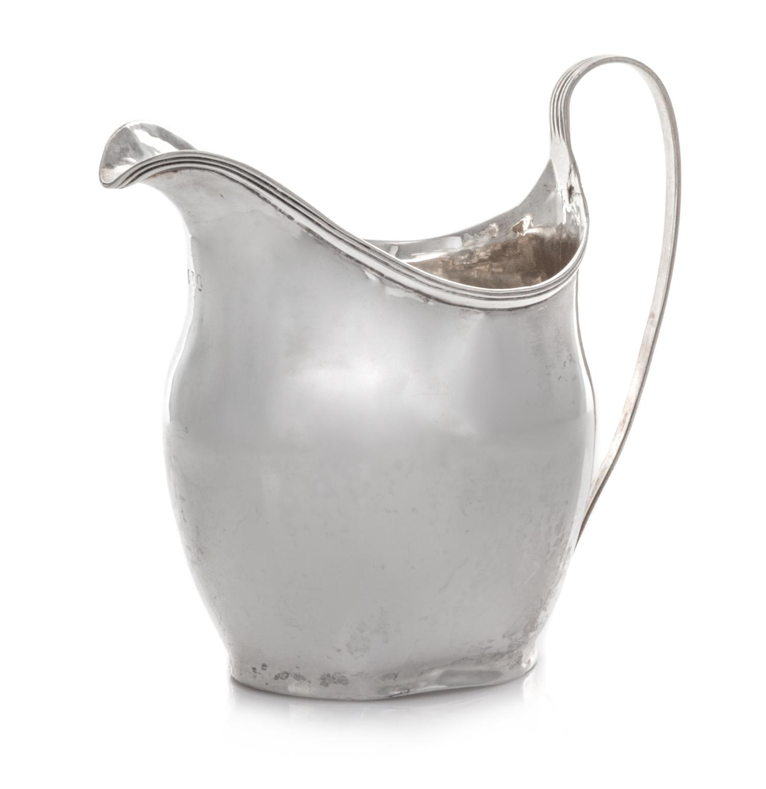 A George III Silver Creamer, Peter & Ann Bateman, London, 1798, of baluster form, with a reeded rim and handle.