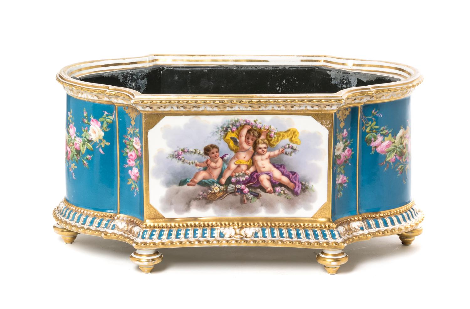 A Sevres Style Porcelain Jardiniere, Height 9 x width 18 inches.
