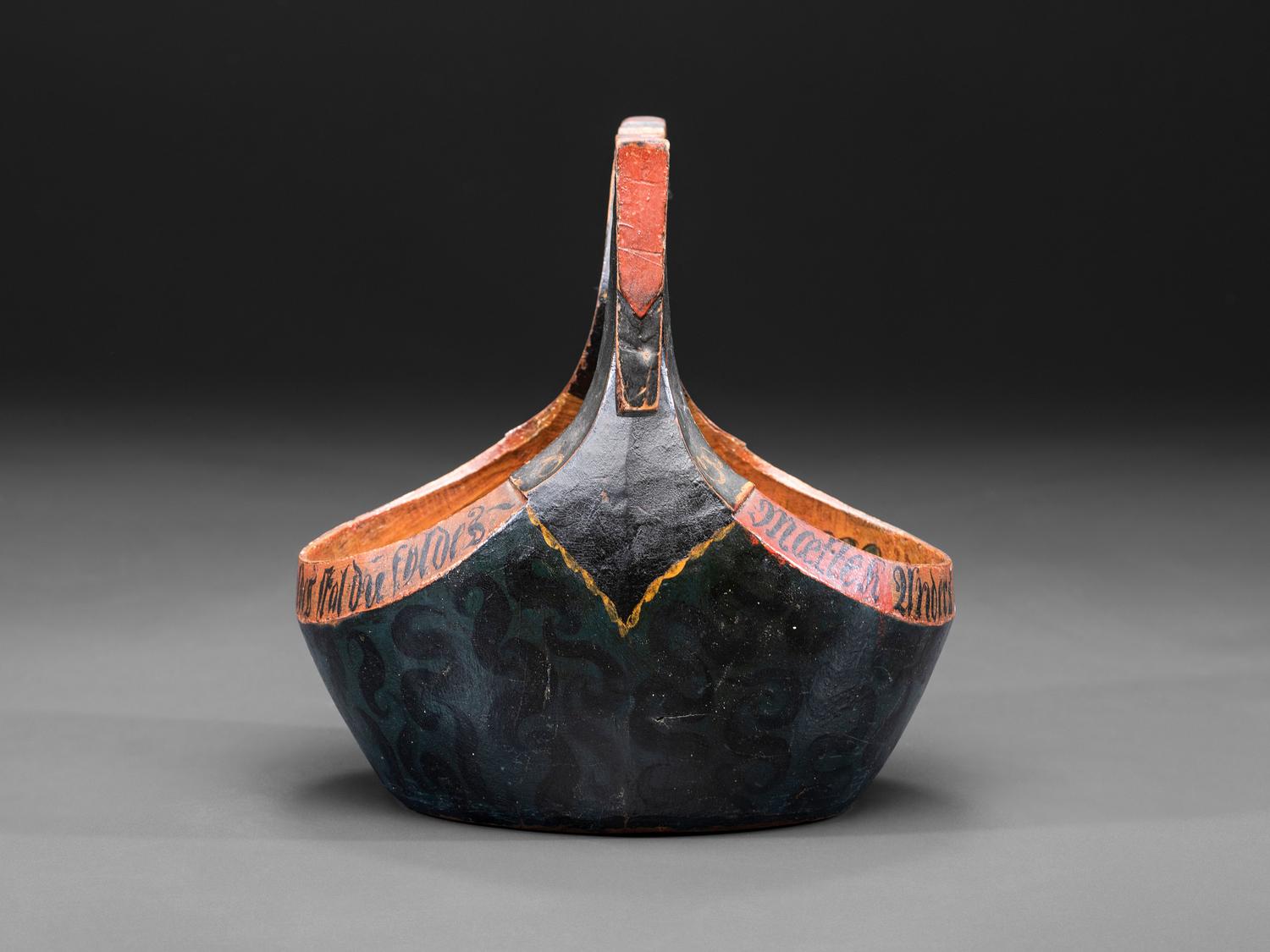A Scandinavian Carved and Painted Wood Ale Bowl